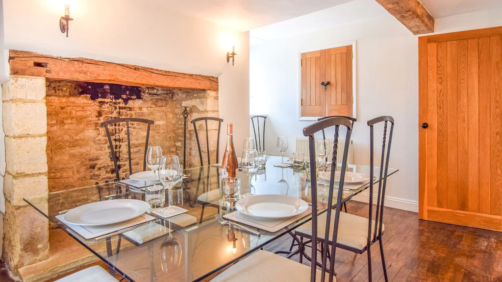 Elegant glass and iron dining set