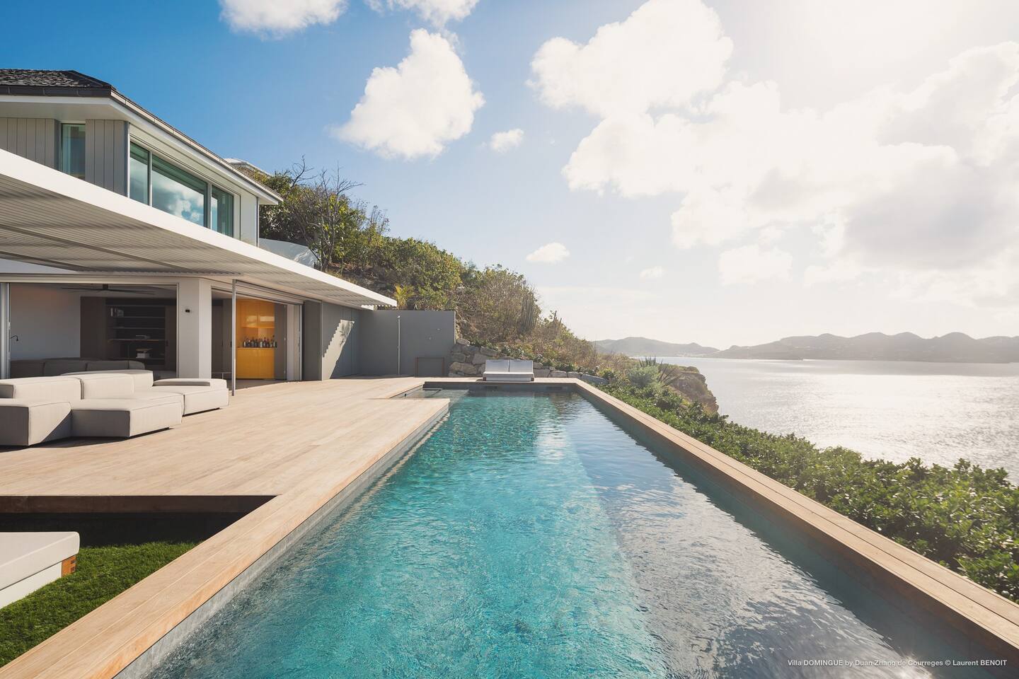 Gorgeous infinity pool of the villa, blending seamlessly with the surrounding landscape and offering a refreshing oasis for relaxation and leisure.