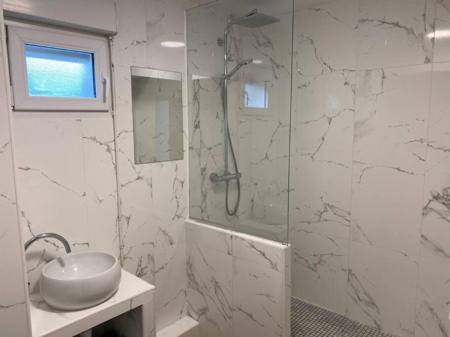 The bathroom is spacious and very clean.