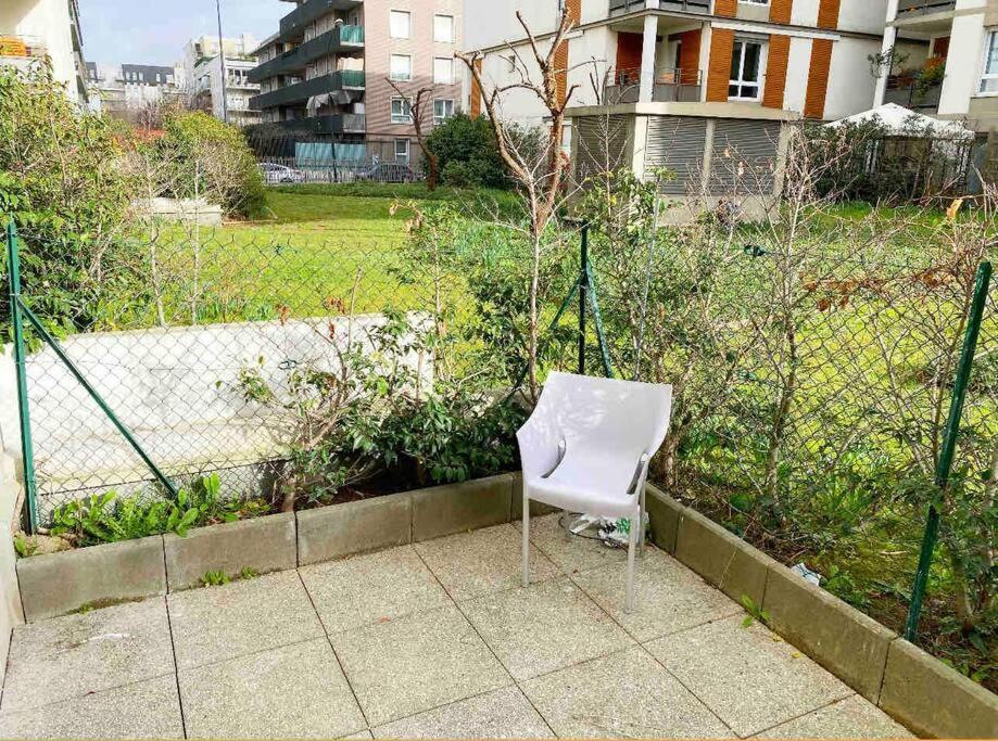 Outside space with a chair for a relaxing breath of fresh air.