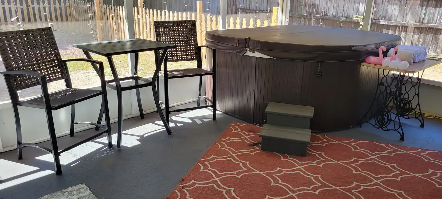Screened in patio with Hot Tub