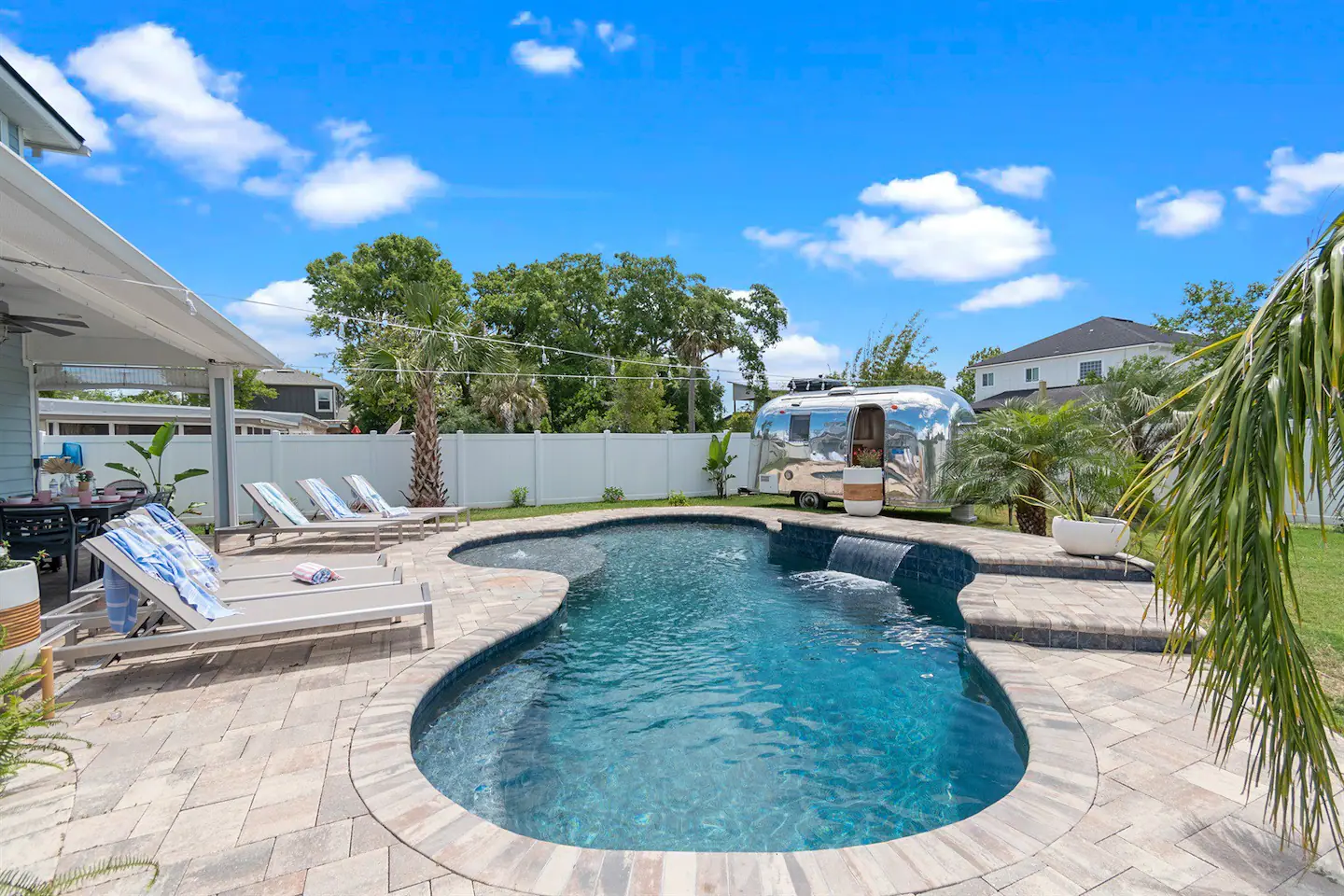 Spacious backyard
Heated pool with waterfall