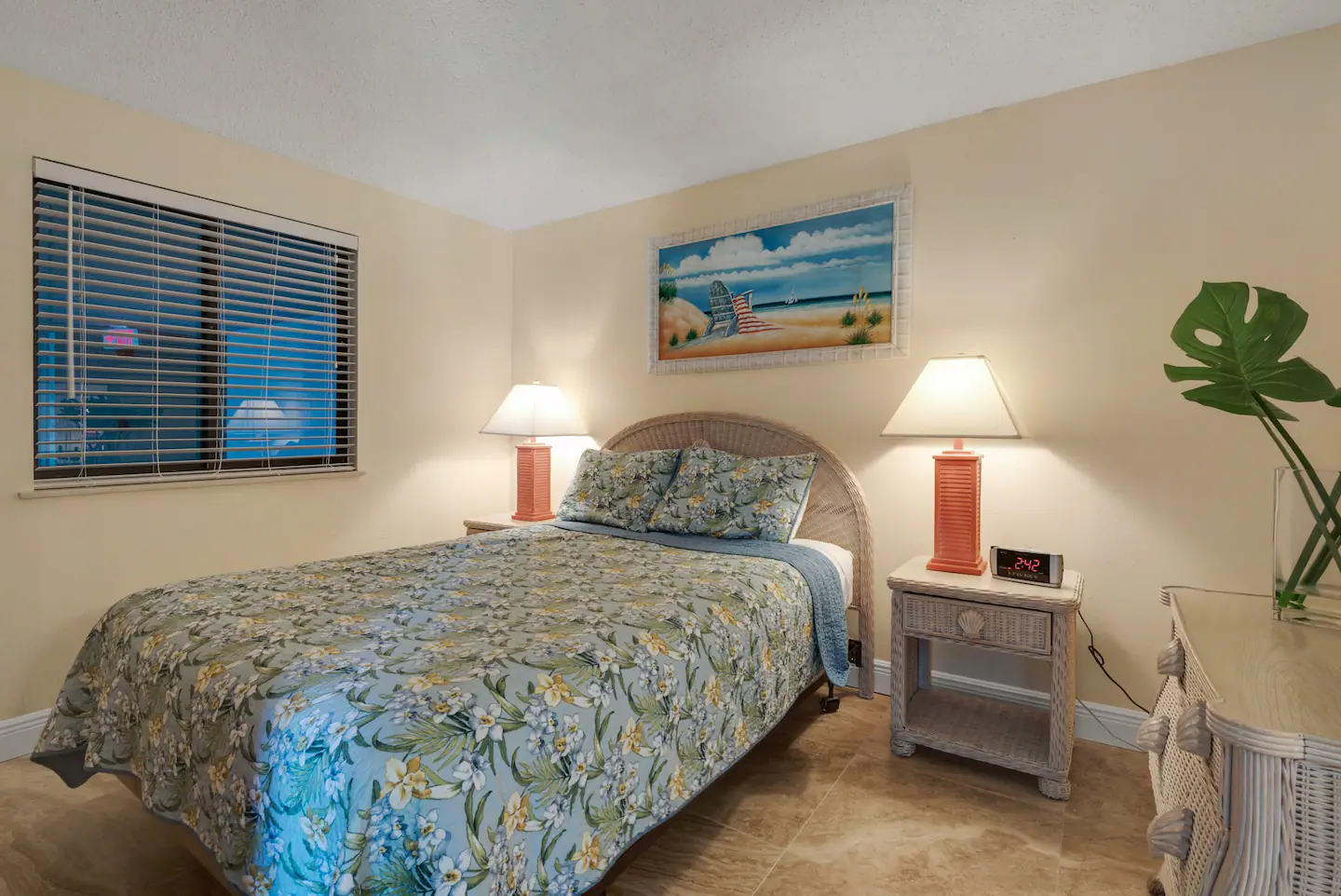 Queen bed in guest bedroom